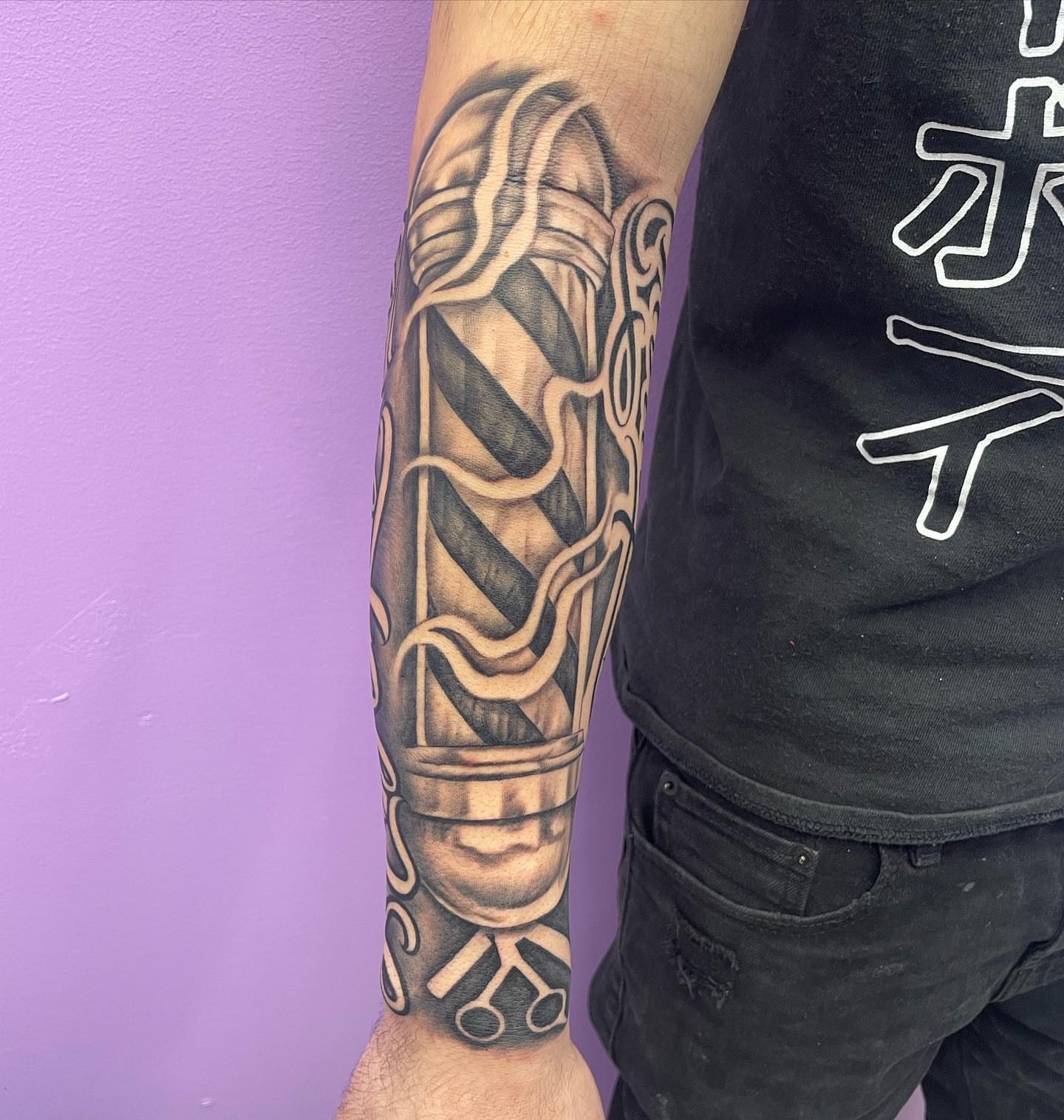 Helmet realism tattoo on the forearm by Blake