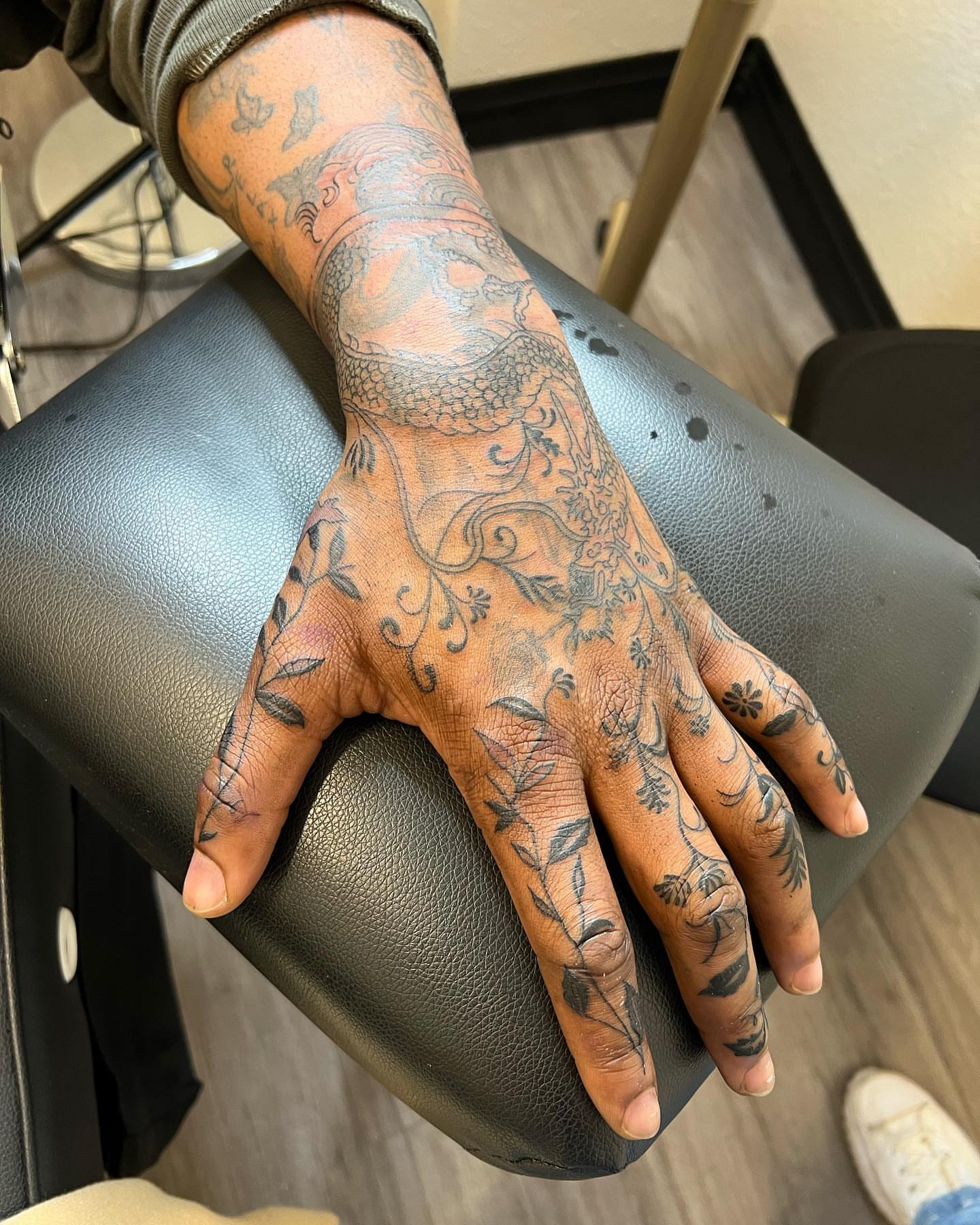 Floral vine black and grey tattoo on the hand by ✨BADJASS the tattoo artist✨