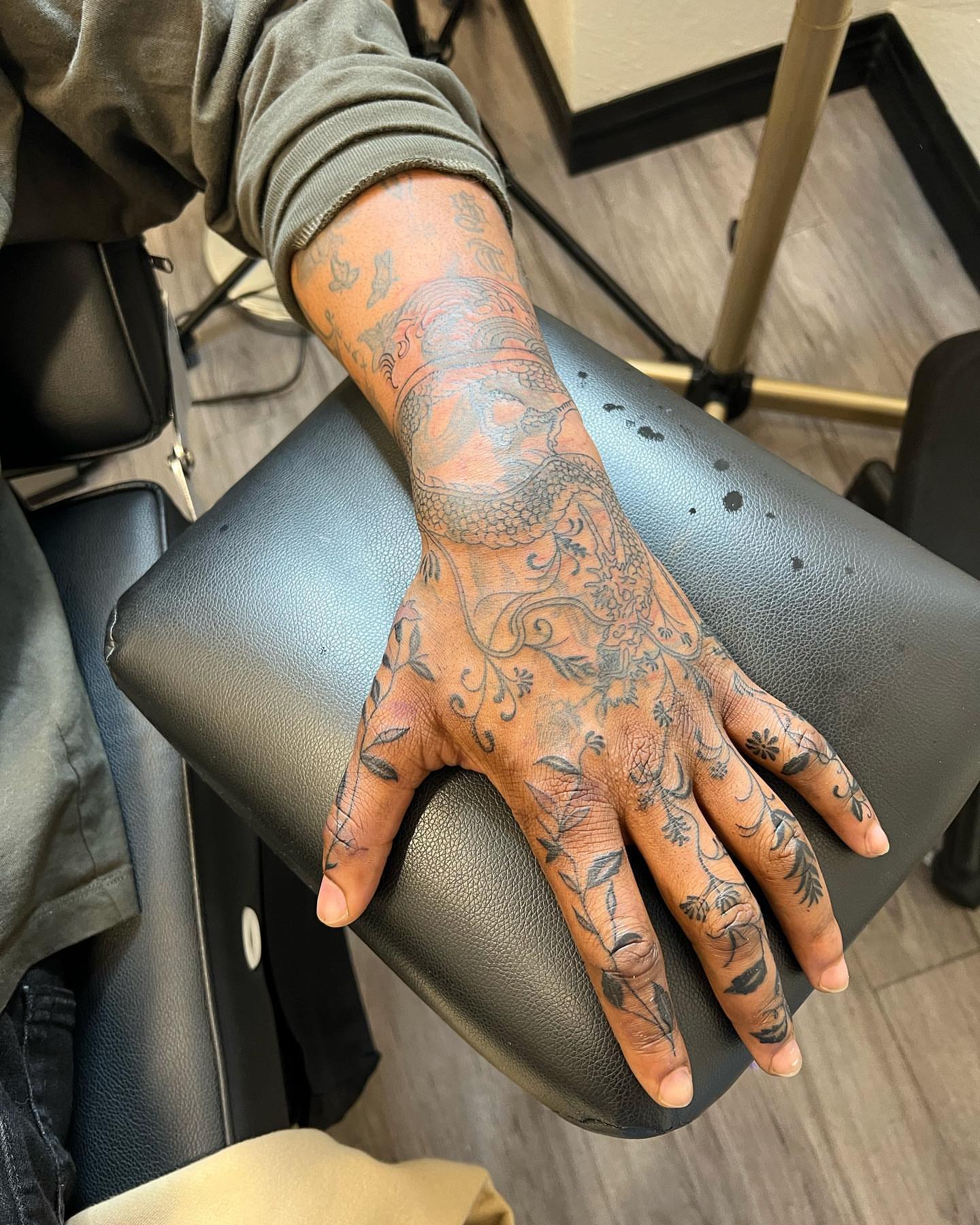 Floral and vine black and grey tattoo on the hand by ✨BADJASS the tattoo artist✨