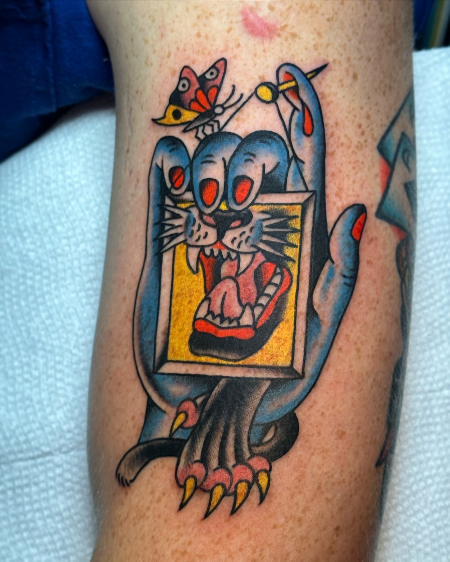 Mouse in a frame American traditional tattoo on the forearm by Britney Goodman
