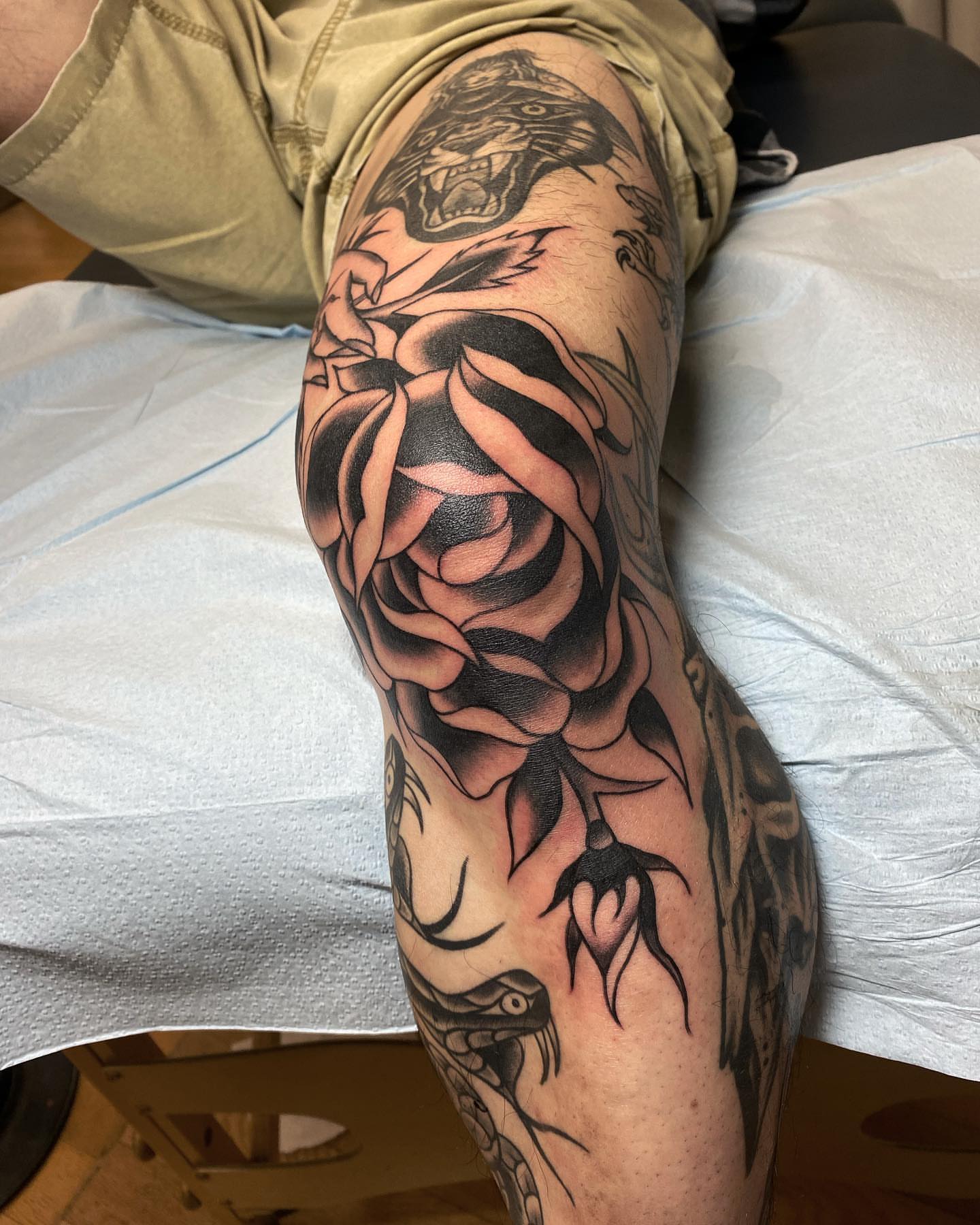 Rose and snake realism tattoo on the forearm by Alan Pham, San Jose, California