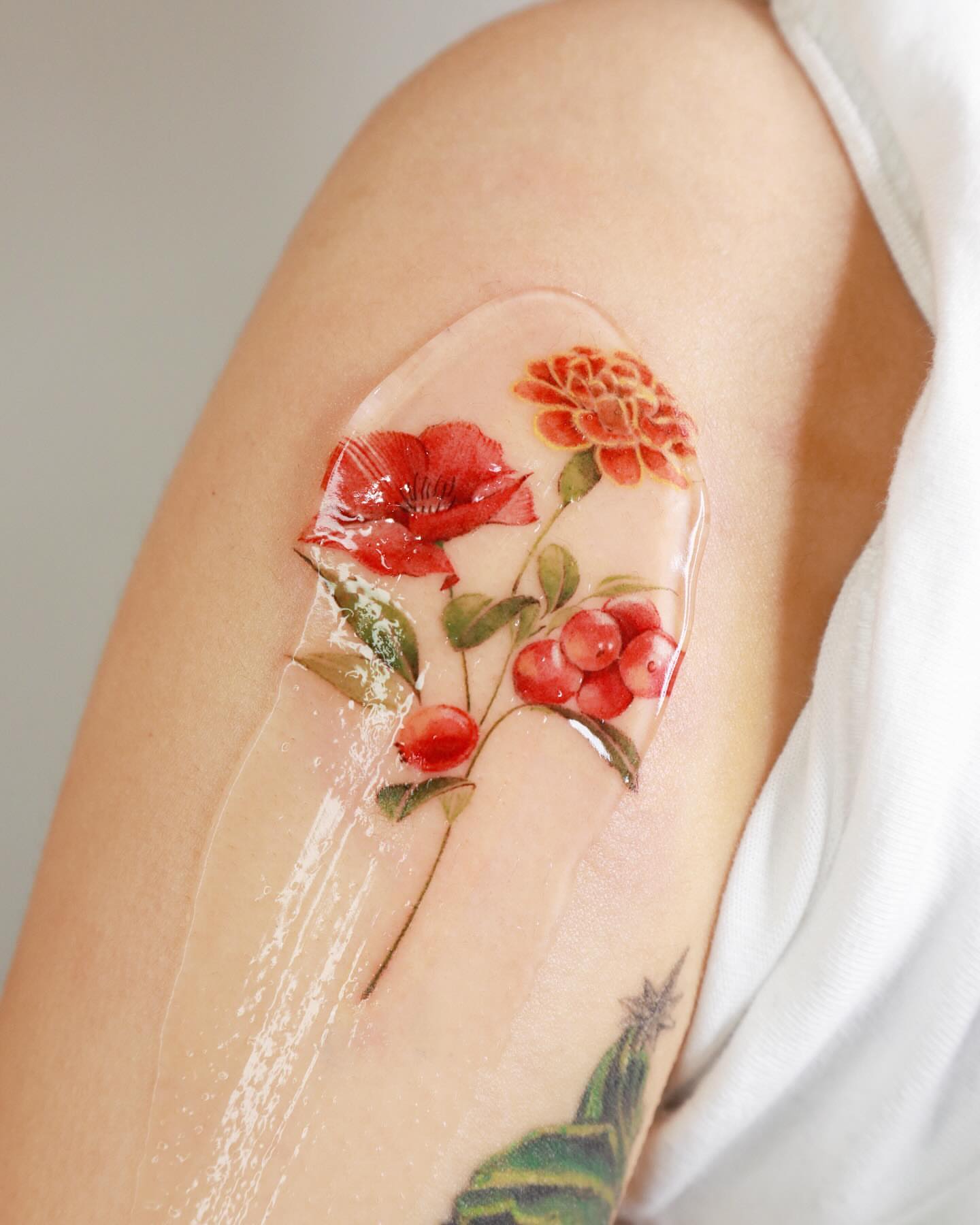 Tattoo by @sozil_tattoo — watercolor