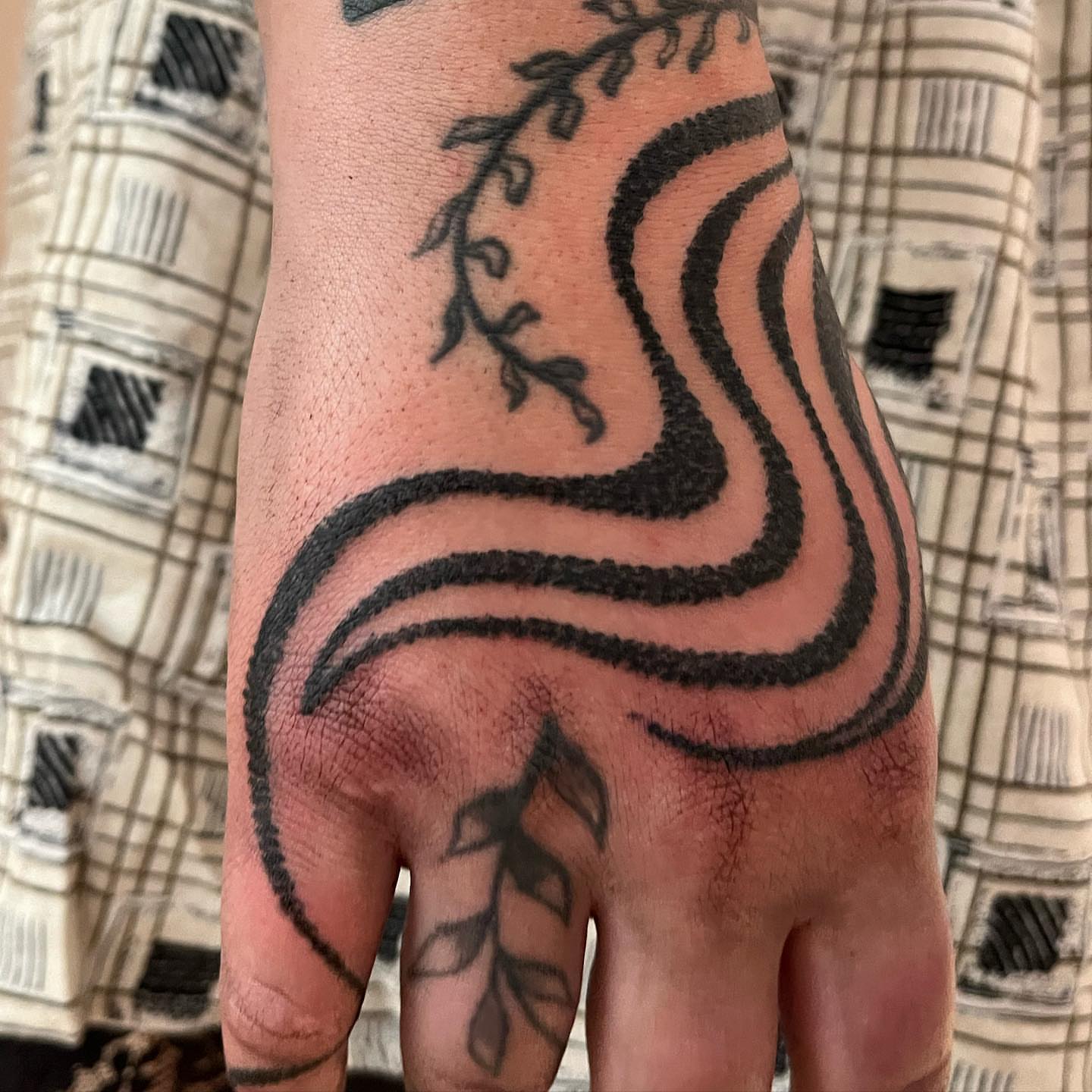 Wave black and grey tattoo on the hand by kevvy