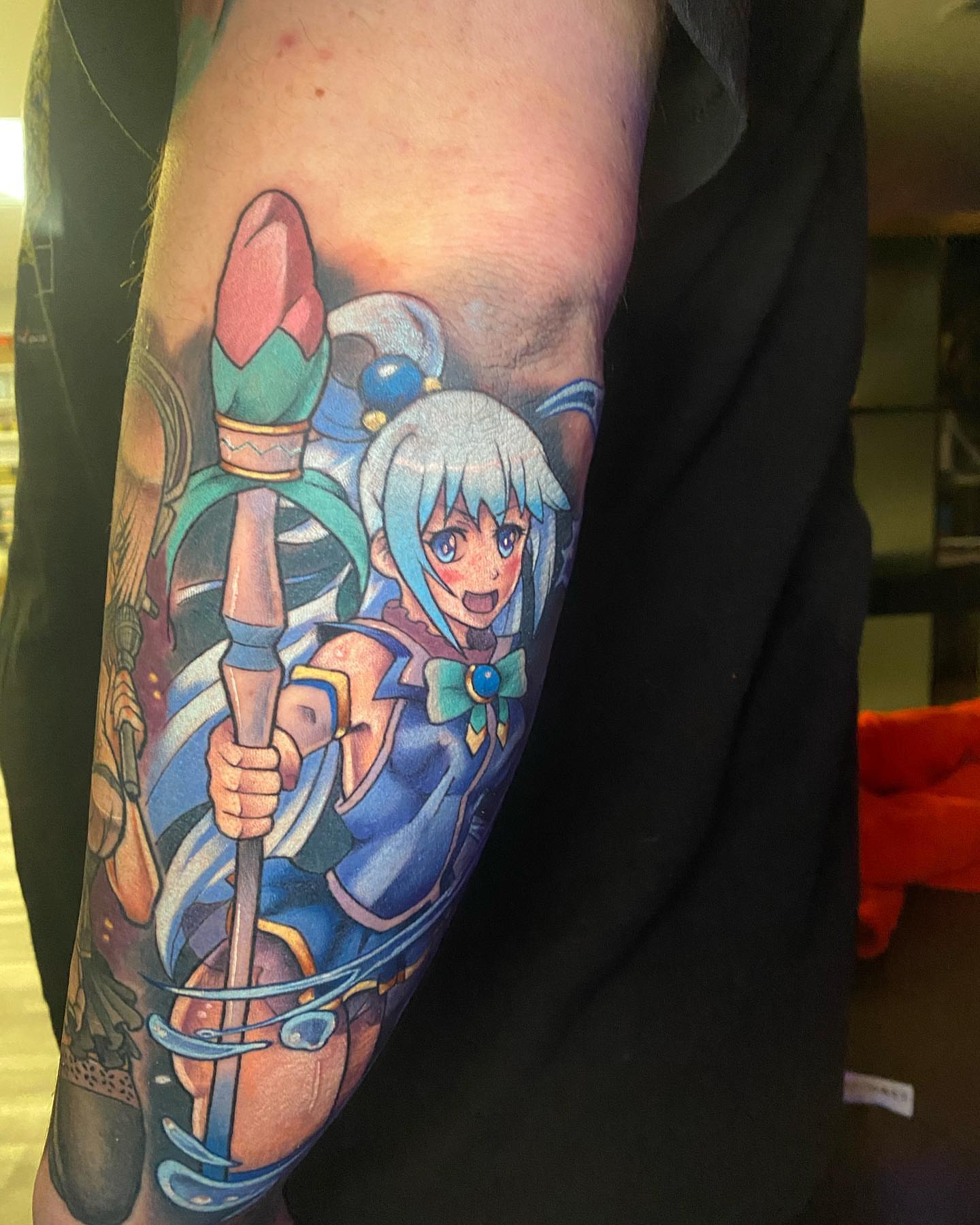 Anime character anime tattoo on the forearm by Tattertot