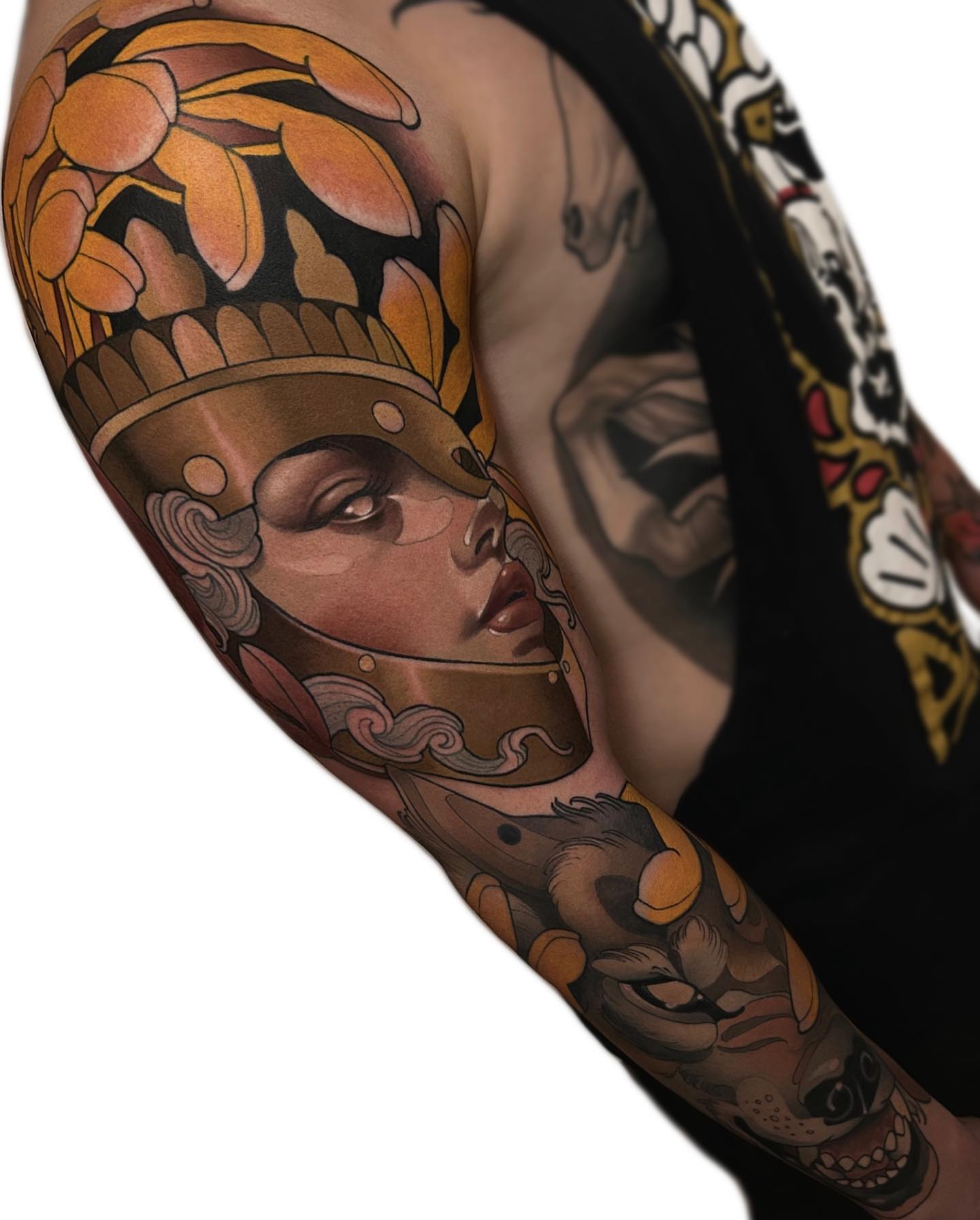 Woman with headdress realism tattoo on the upper arm by Levi Murphy