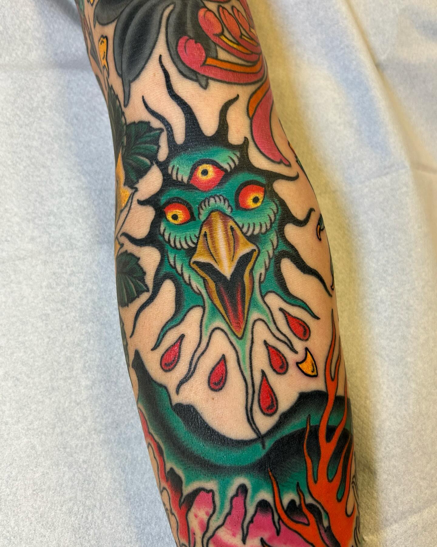 Owl American traditional tattoo on the forearm by Adam Mir