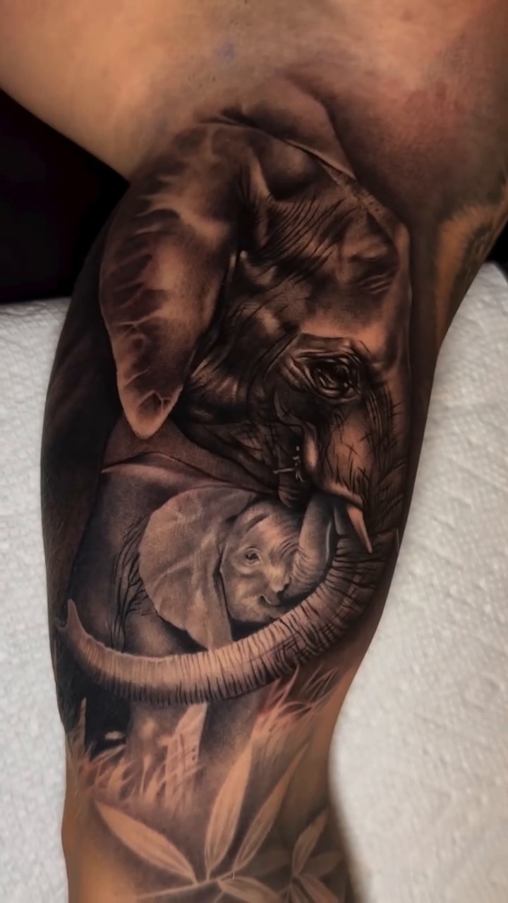 Elephant and cub realism tattoo by Ana Reyes