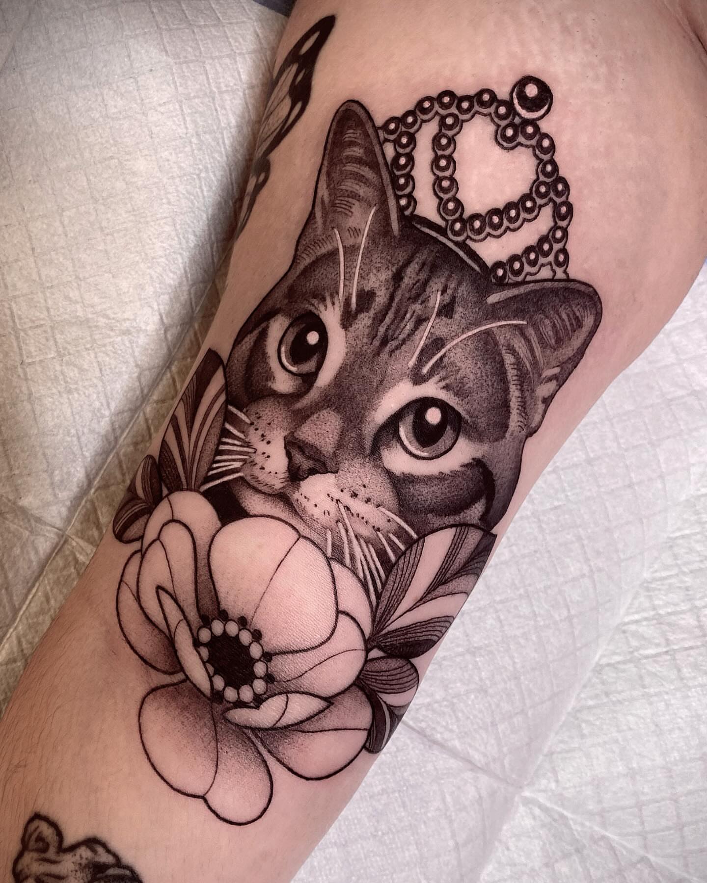 Tattoo by @n.dickinson — realism, dotwork