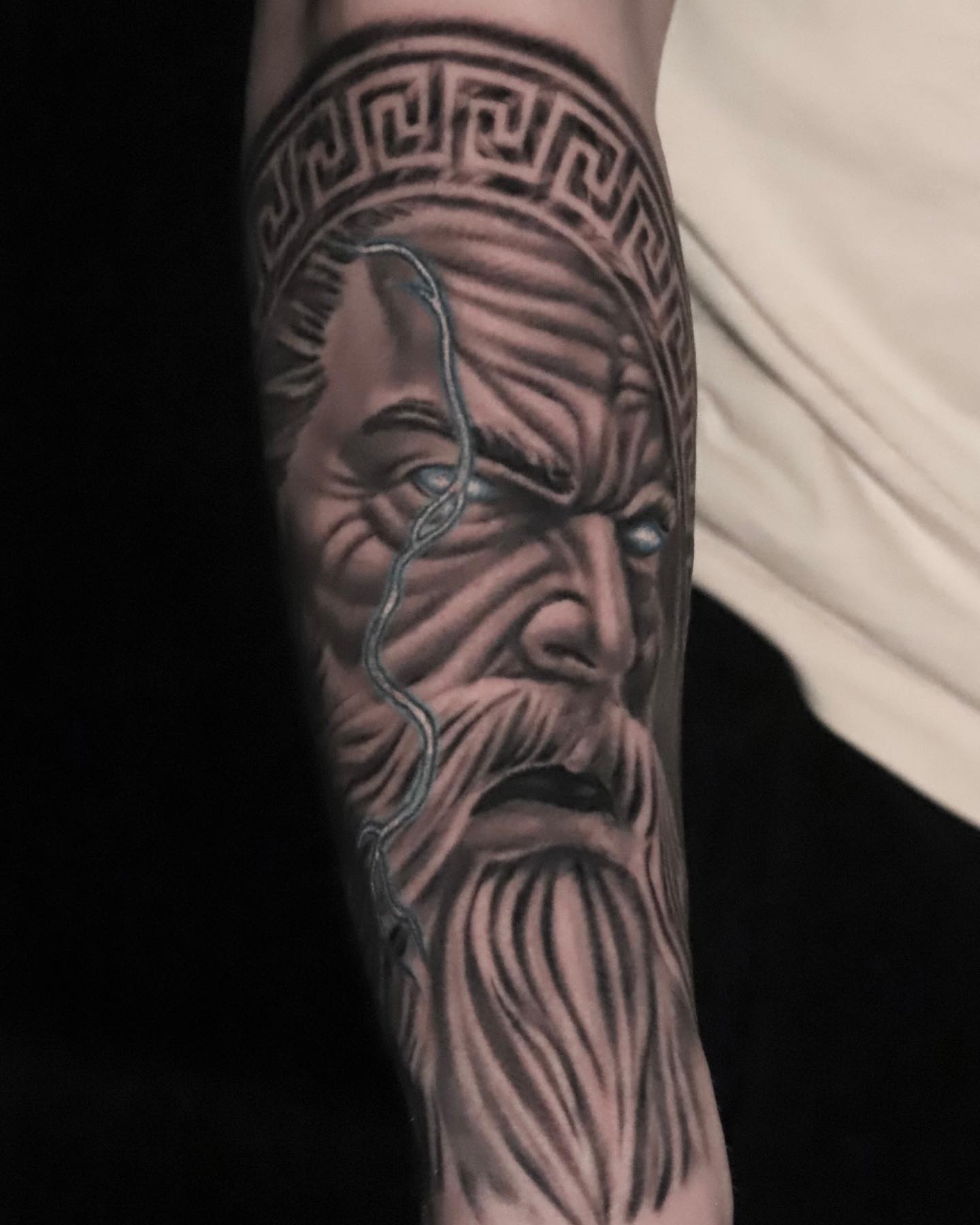 Ancient god realism tattoo on the forearm by Jacob Martin, Toledo, Ohio