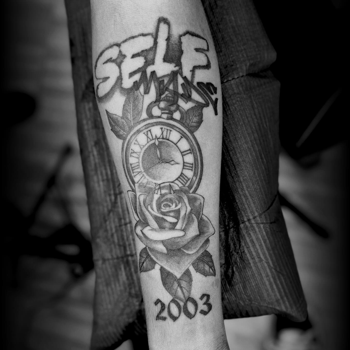 Clock and rose American traditional tattoo on the forearm by Steve