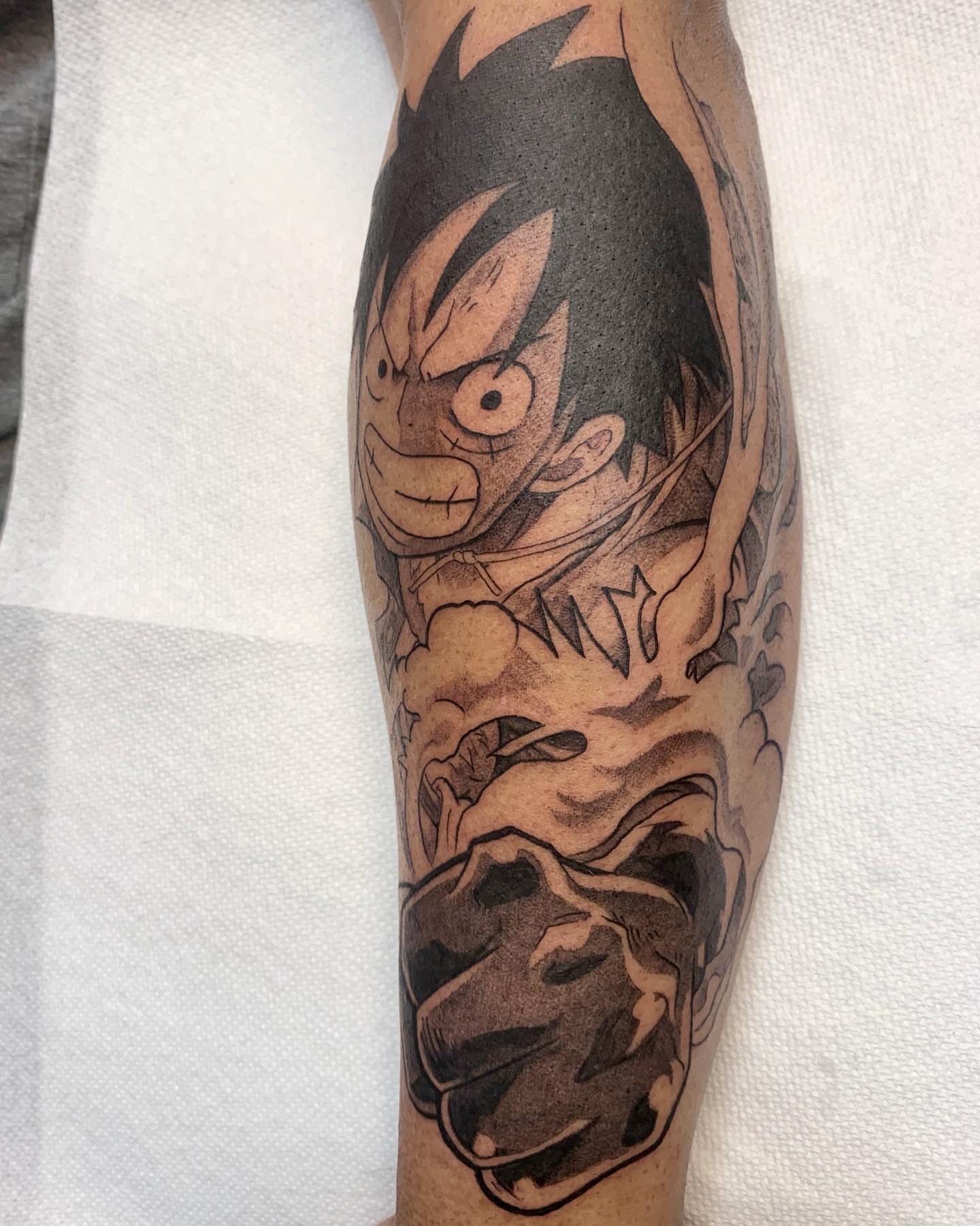 Son goku anime tattoo on the forearm by Sarah
