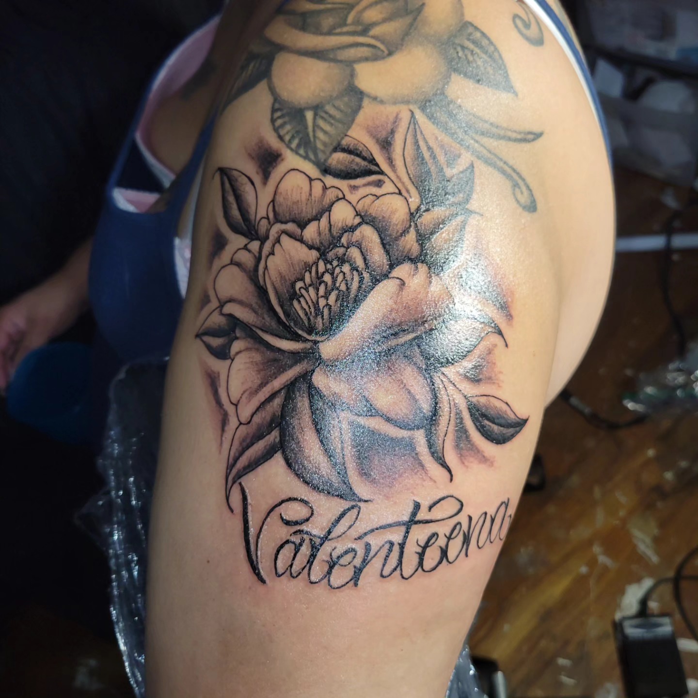 Peony flower realism tattoo on the thigh by Markus Hicks