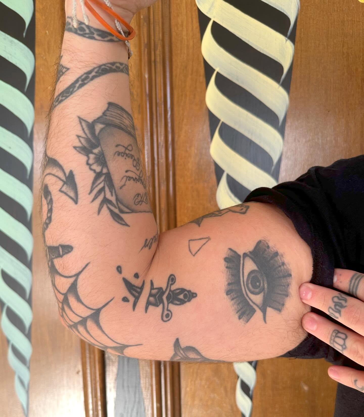 Eye and dagger black and grey tattoo on the forearm by Jess Ritchie, Austin, Texas