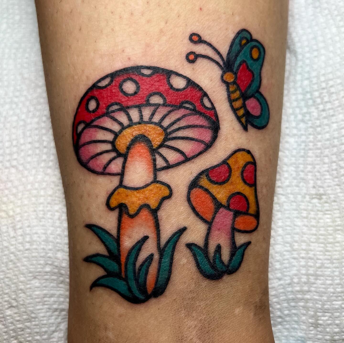 Mushrooms and butterfly American traditional tattoo on the forearm by 🍓miranda joon bradbury🍓