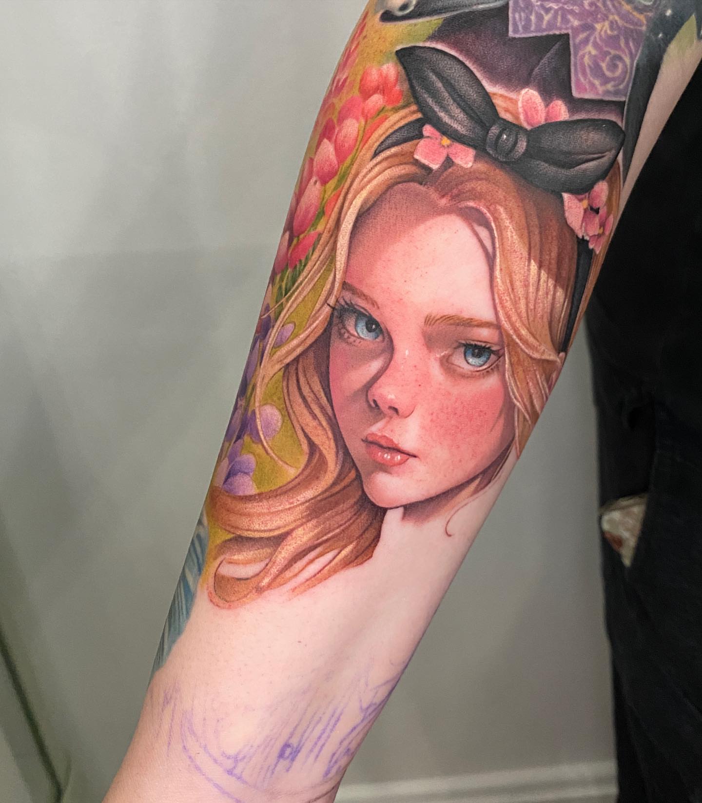 Portrait of a woman realism tattoo on the forearm by Anali De Laney