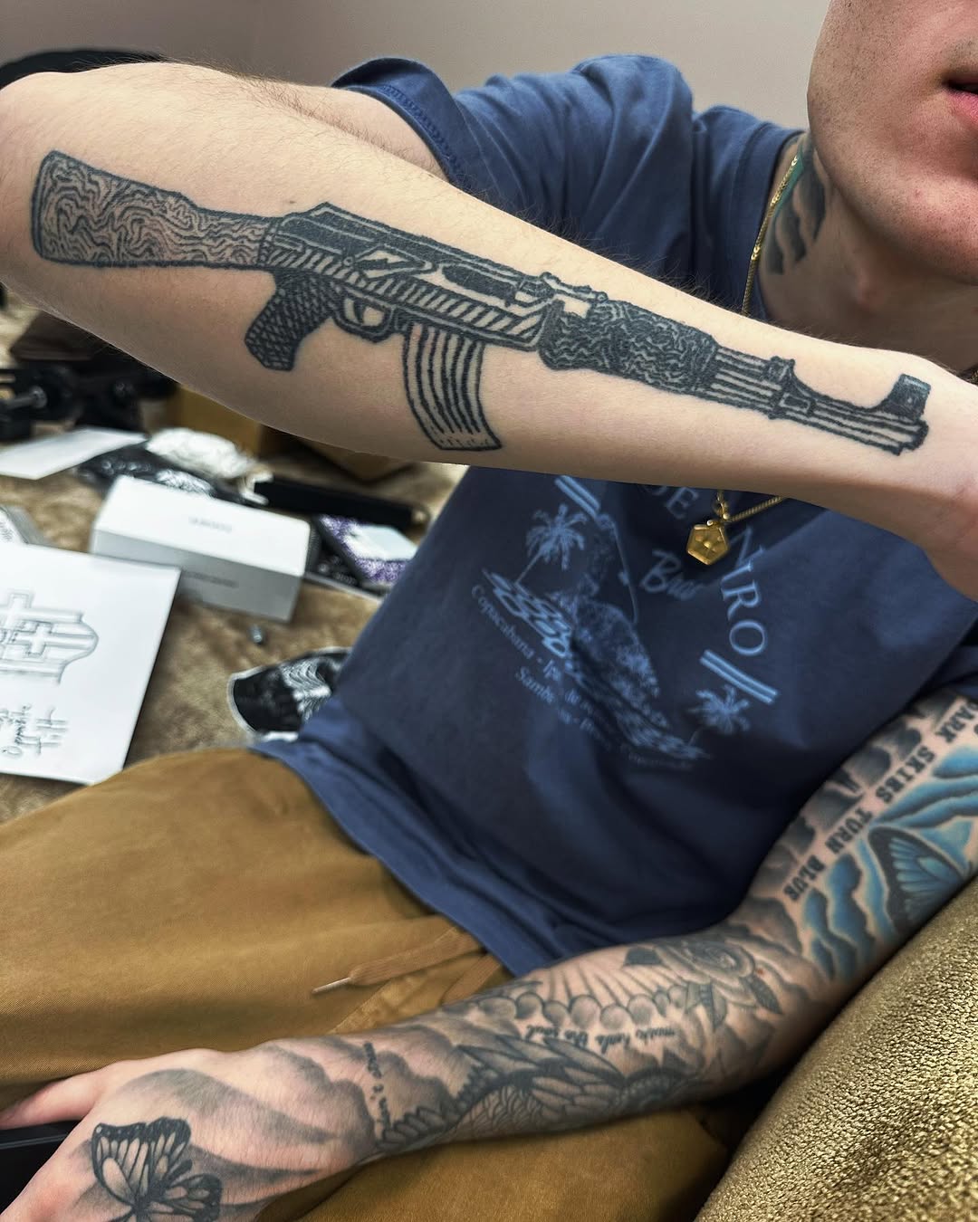 AK-47 rifle tattoo on the forearm by Silky Inks NJ 201, North Haledon, New Jersey