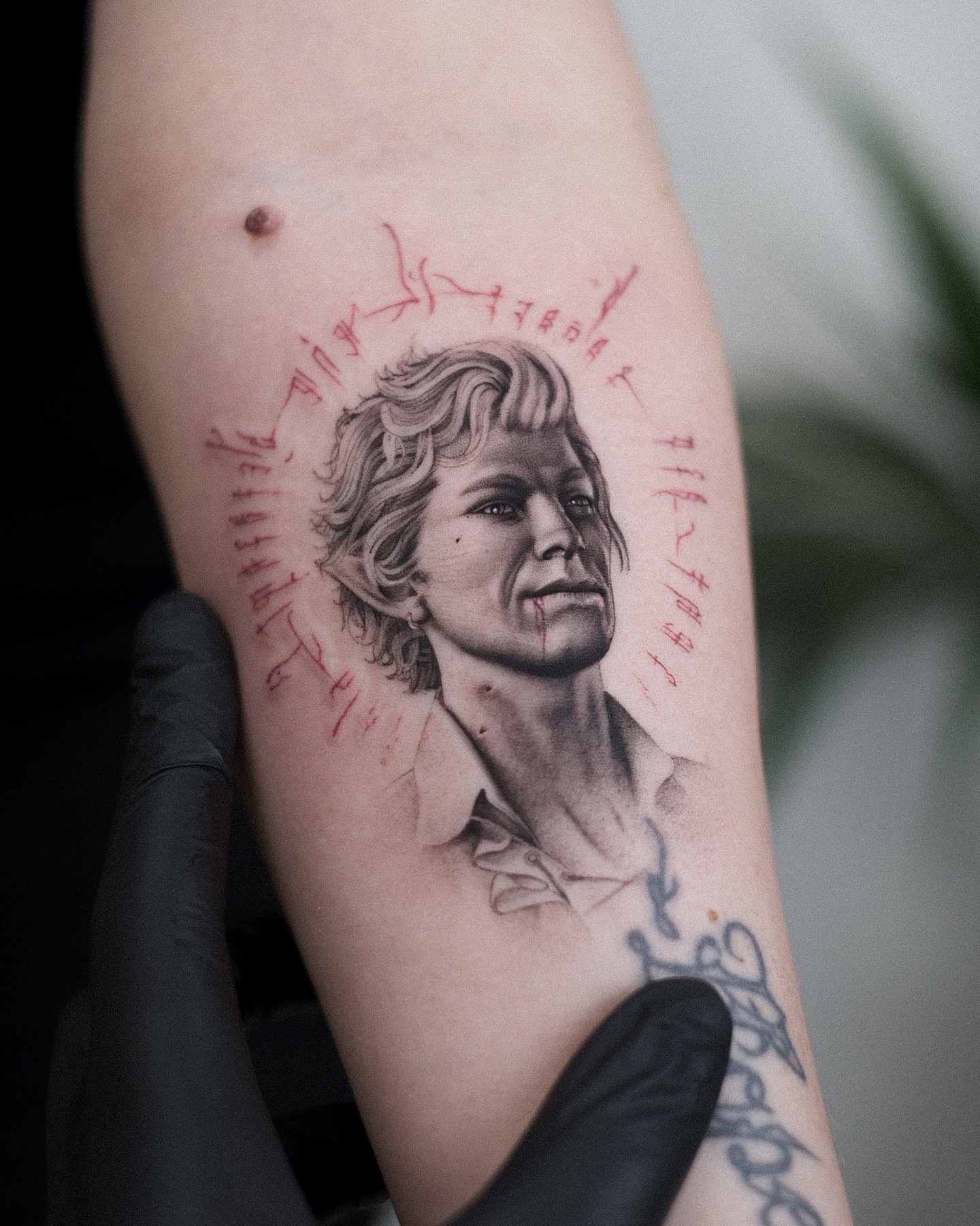 Portrait of a person realism tattoo on the forearm by Oleksandr Moroz