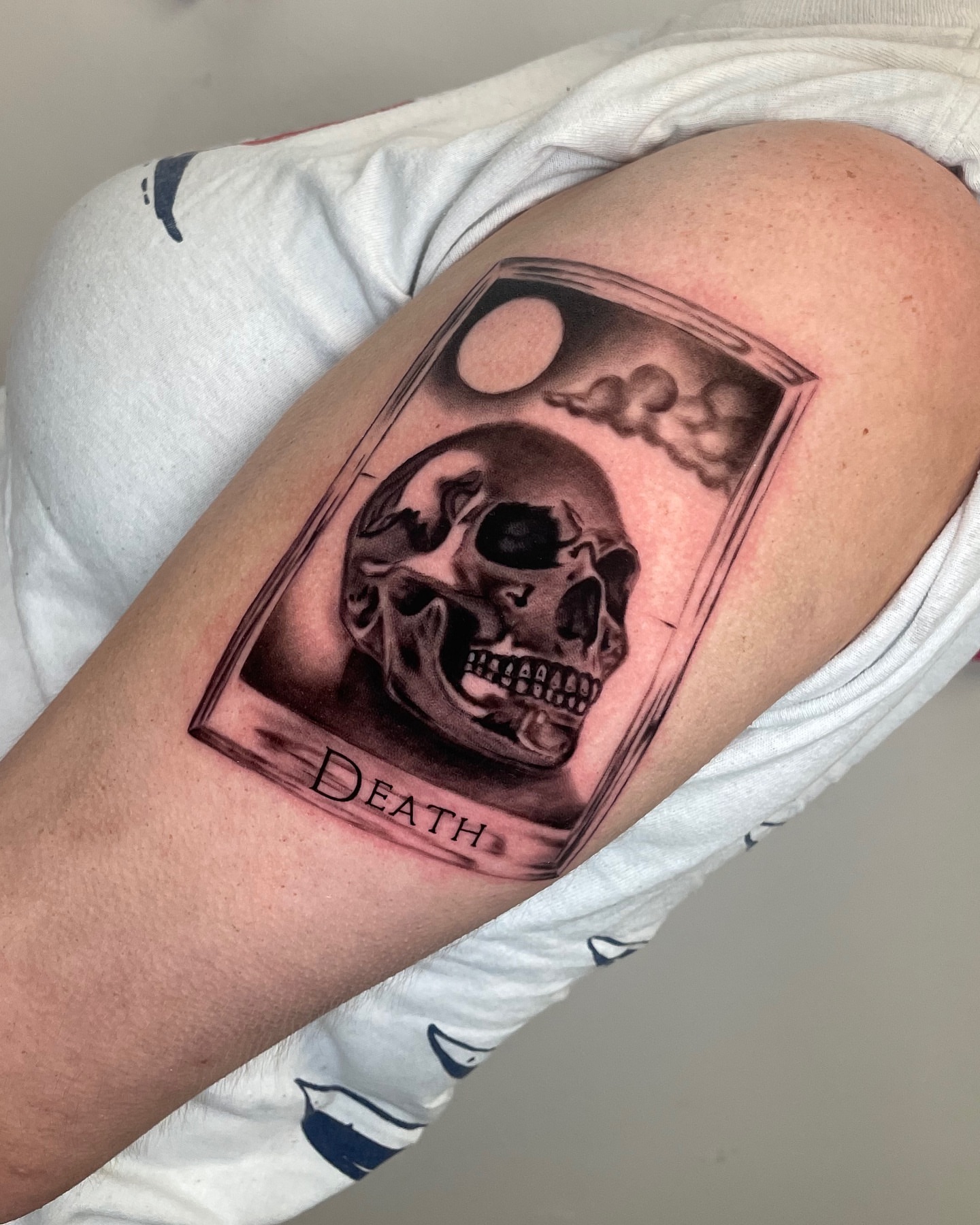 Death card realism tattoo on the thigh by Mel