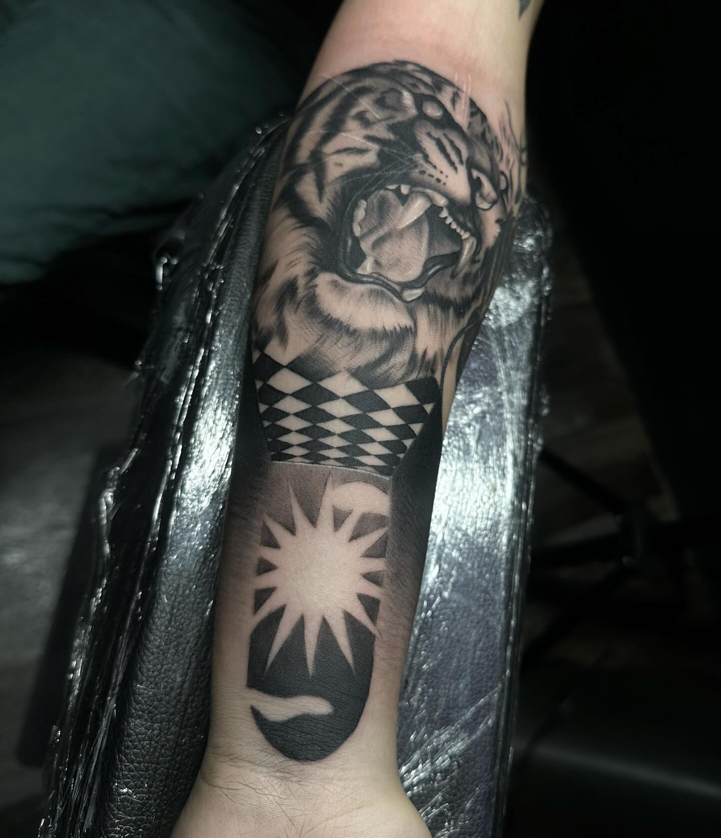 Tiger realism tattoo on the forearm by Tattoosxjoseph