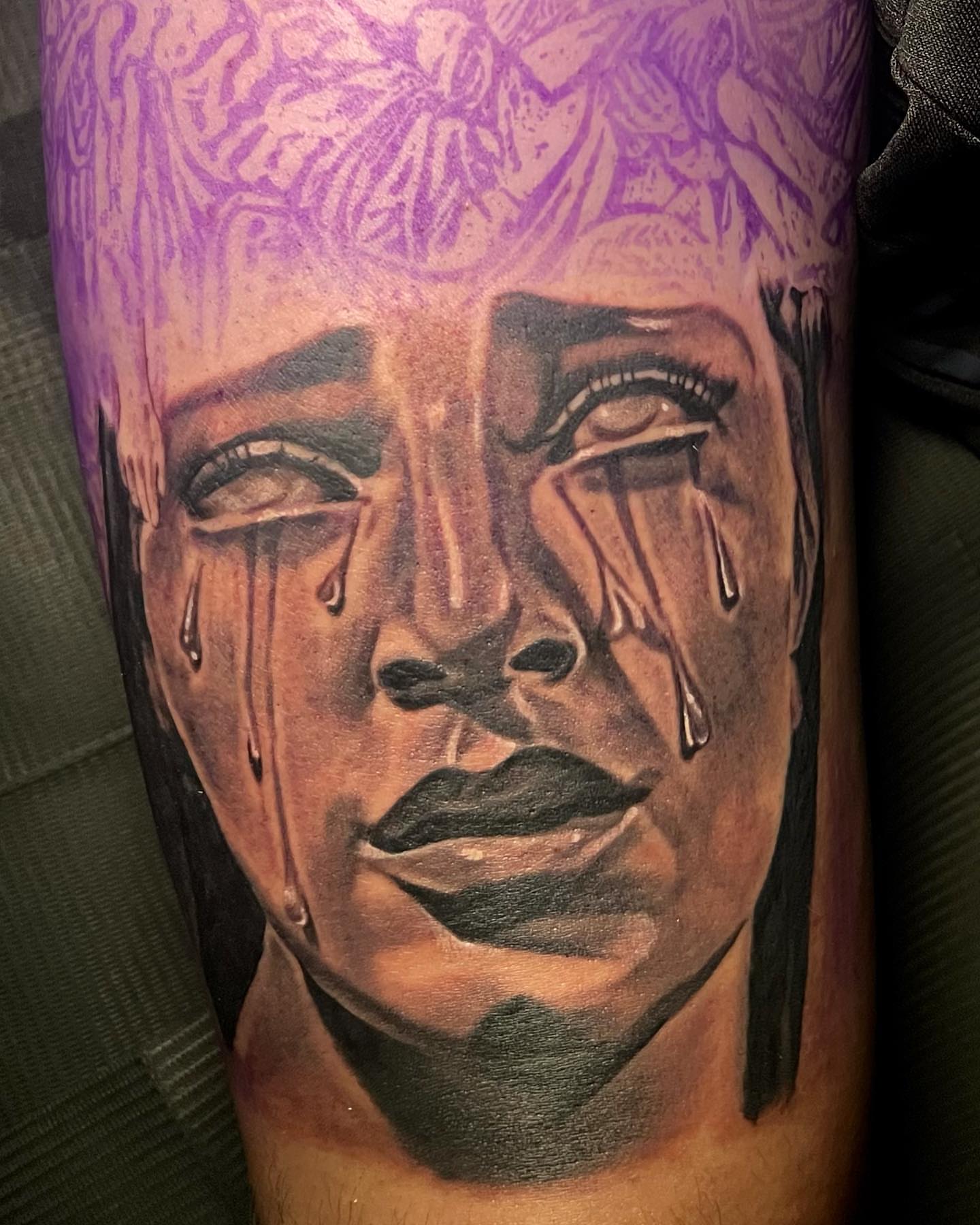 Tearful face realism tattoo on the forearm by The Tattoo Saint- DMV Tattoo Artist, Hyattsville, Maryland
