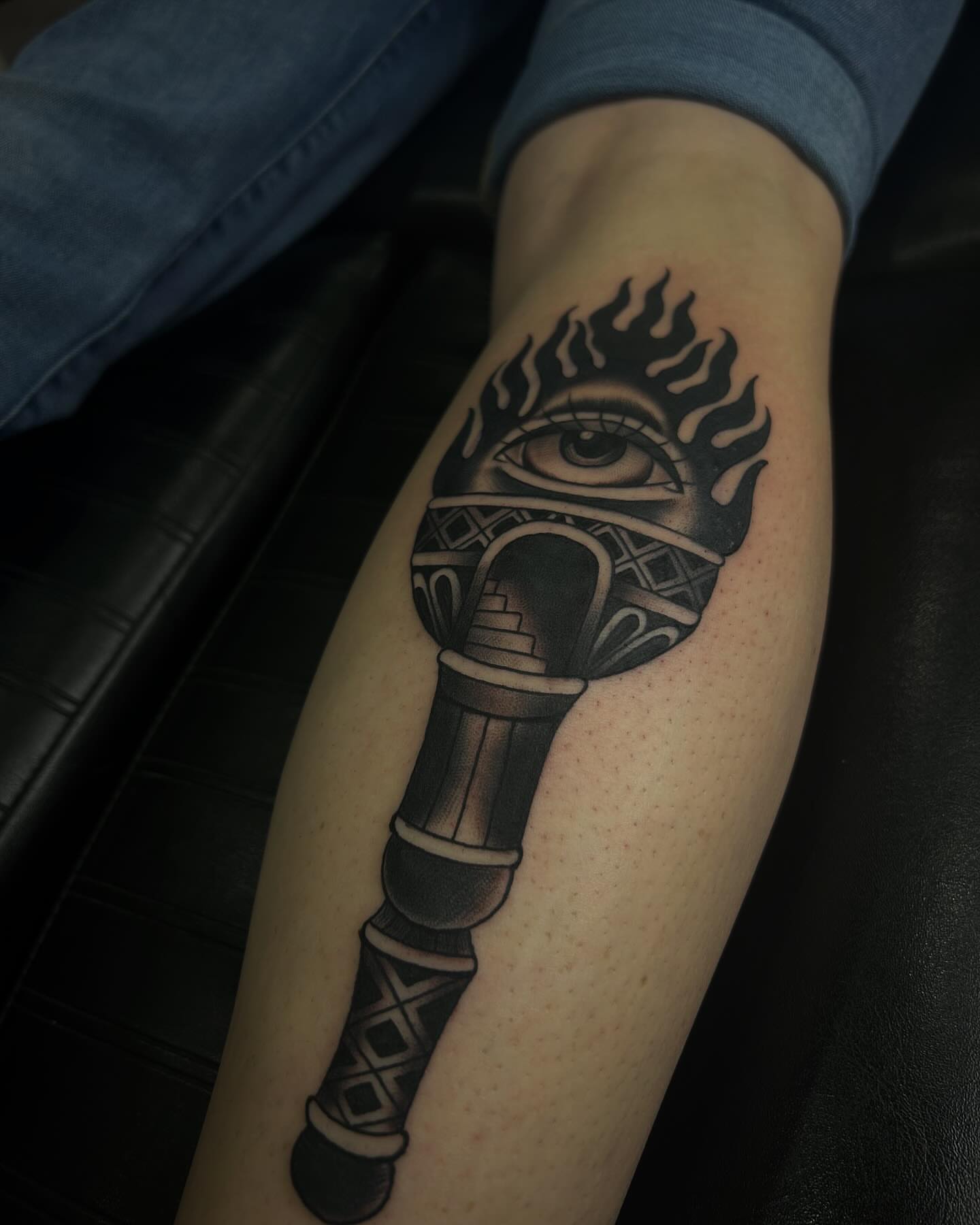 Eye with flame geometric tattoo on the forearm by Samantha C, Bremerton, Washington