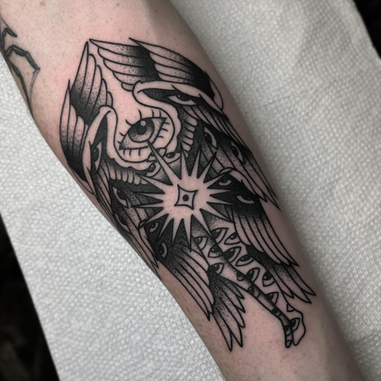 Eye and wings geometric tattoo on the forearm by Beejay Tattoo Artist San Antonio Amarillo TX