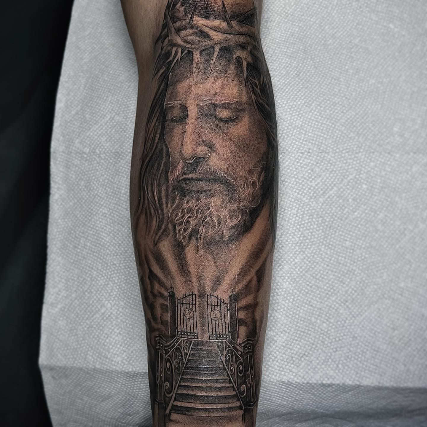 Religious figure realism tattoo on the forearm by Nj Tattoo Artist Inkdyou, Bloomfield, New Jersey