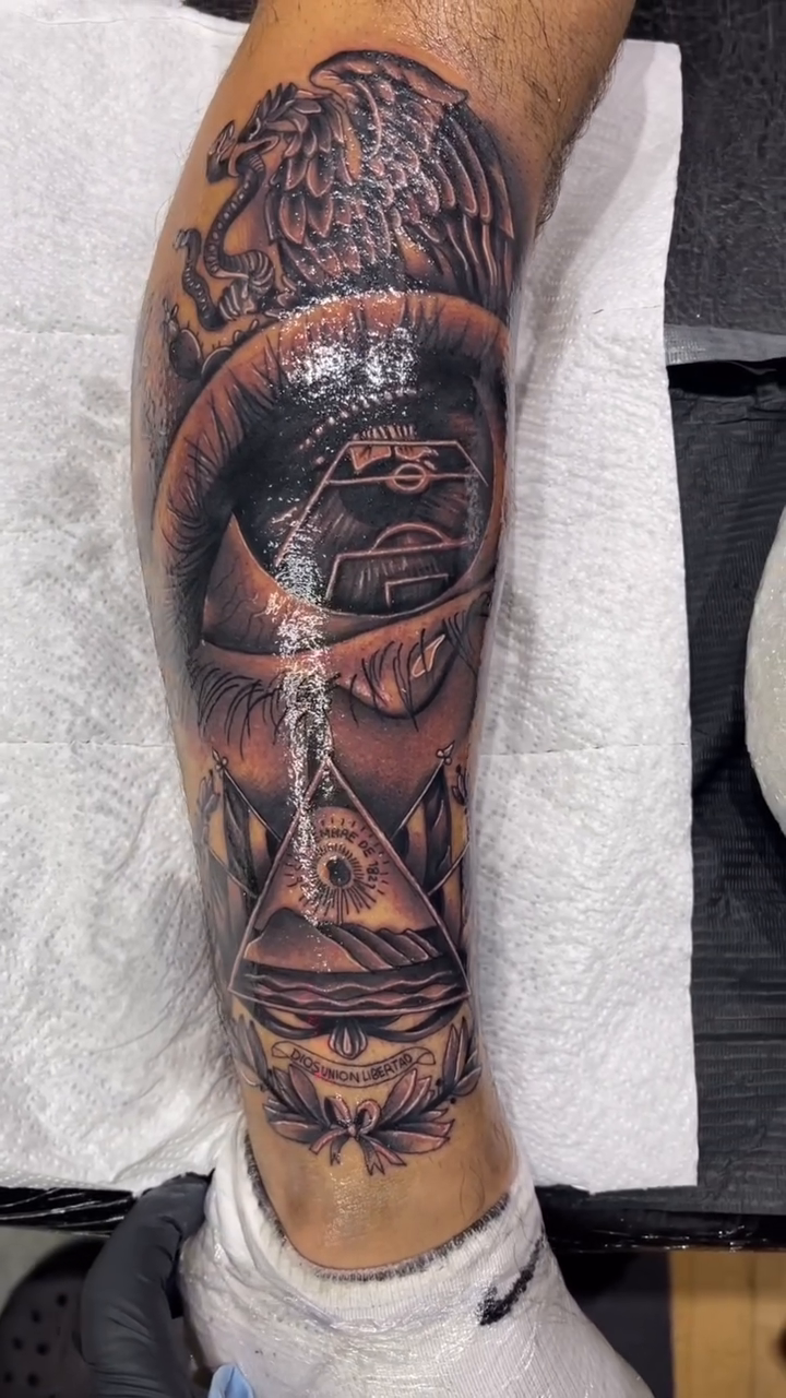 Eye with pyramid and eagle realism tattoo by LOS