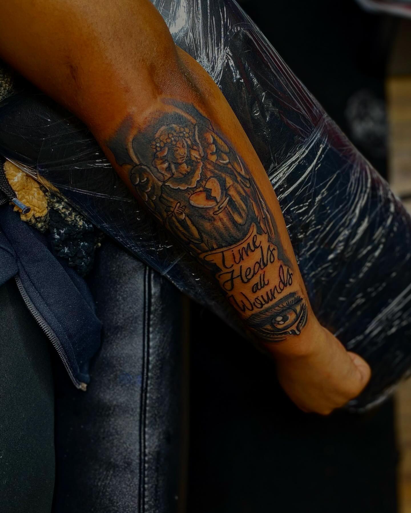 Time heals all wounds American traditional tattoo on the forearm by Rell Washington, Marlow Heights, Maryland