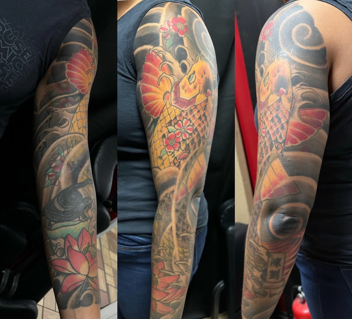 Koi fish japanese irezumi tattoo on the upper arm by vannadoestattoos