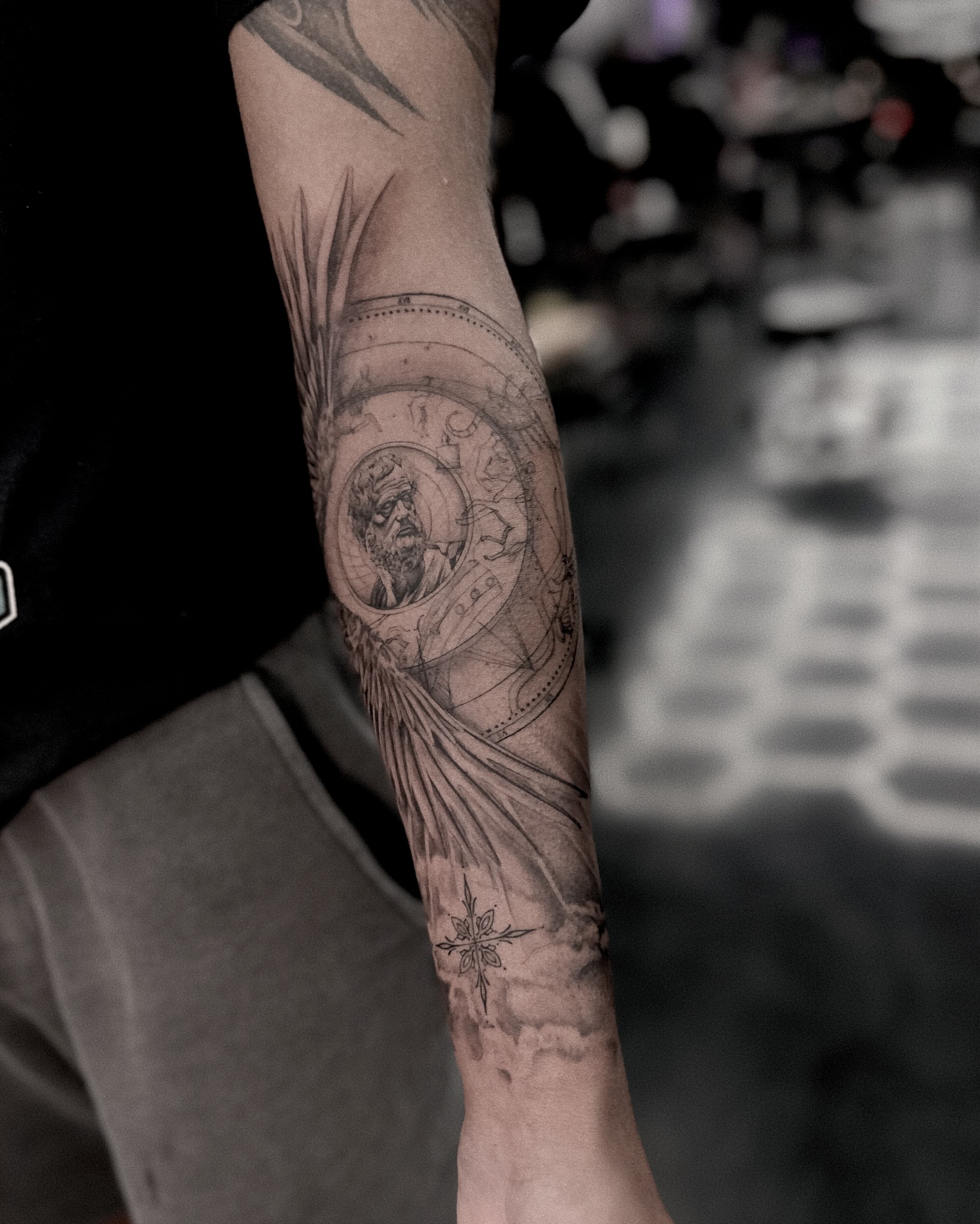 Ancient figure with shield realism tattoo on the forearm by Ron Alvarez
