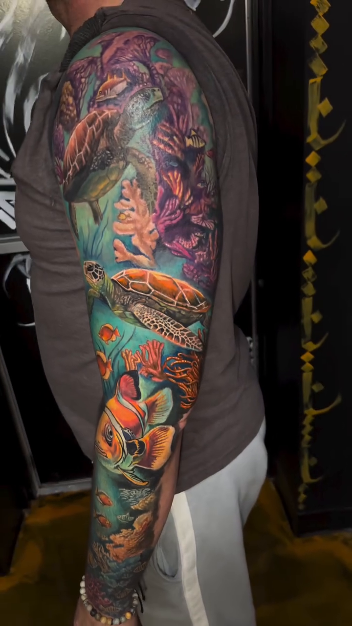 Underwater scene with turtles and fish realism tattoo by Joseph Delaparra