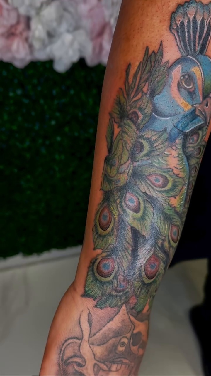 Peacock realism tattoo by Erika Nambo
