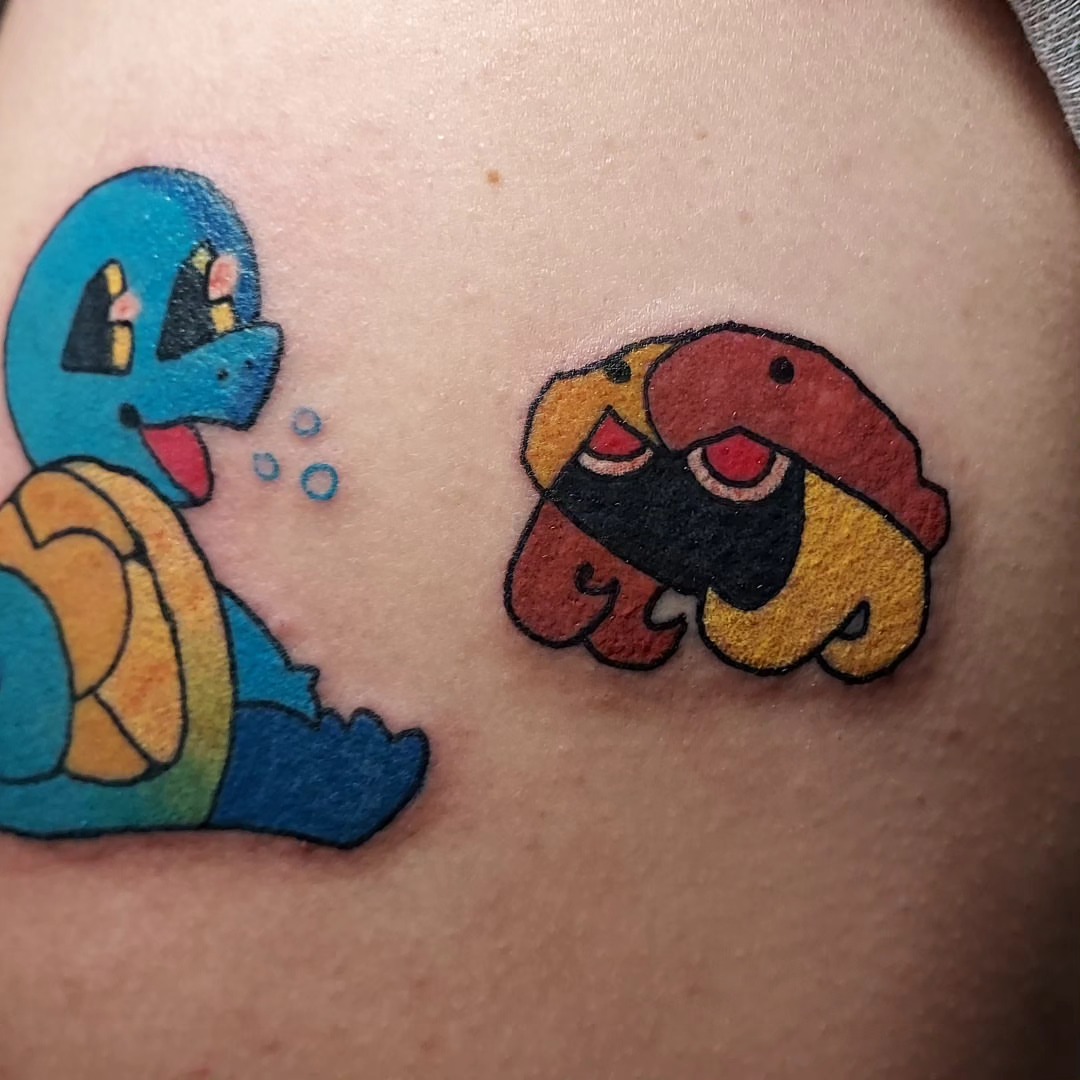 Squirtle and charmander new school tattoo on the thigh by Spike Cameron