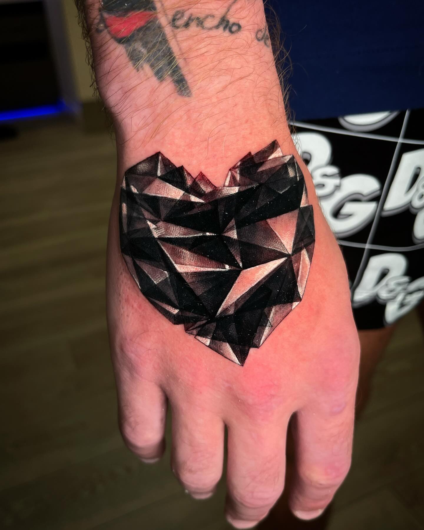 Geometric heart geometric tattoo on the hand by Claude Steven Estrada, Las Vegas, Nevada