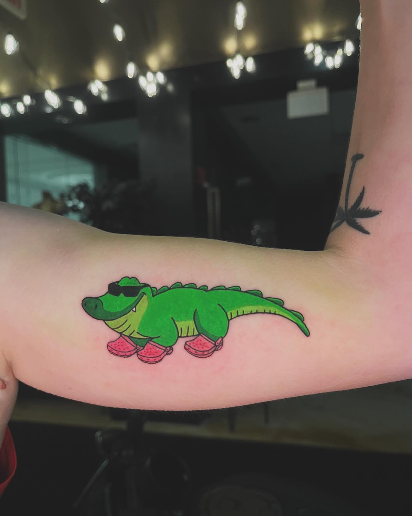 Alligator wearing sunglasses and pink shoes new school tattoo on the forearm by ππ²π΅π π§ - π£πͺπ½π½πΈπΈ ππ»π½π²πΌπ½