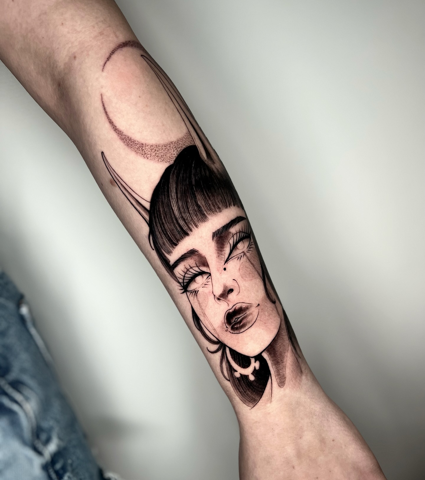 Woman's face dotwork tattoo on the forearm by Angelo Buonanno, Las Vegas, Nevada