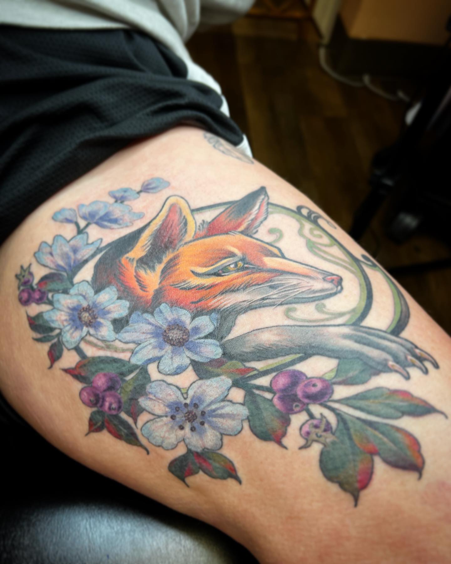 Fox and flowers new school tattoo on the thigh by Sam Minter, Grafton, Massachusetts