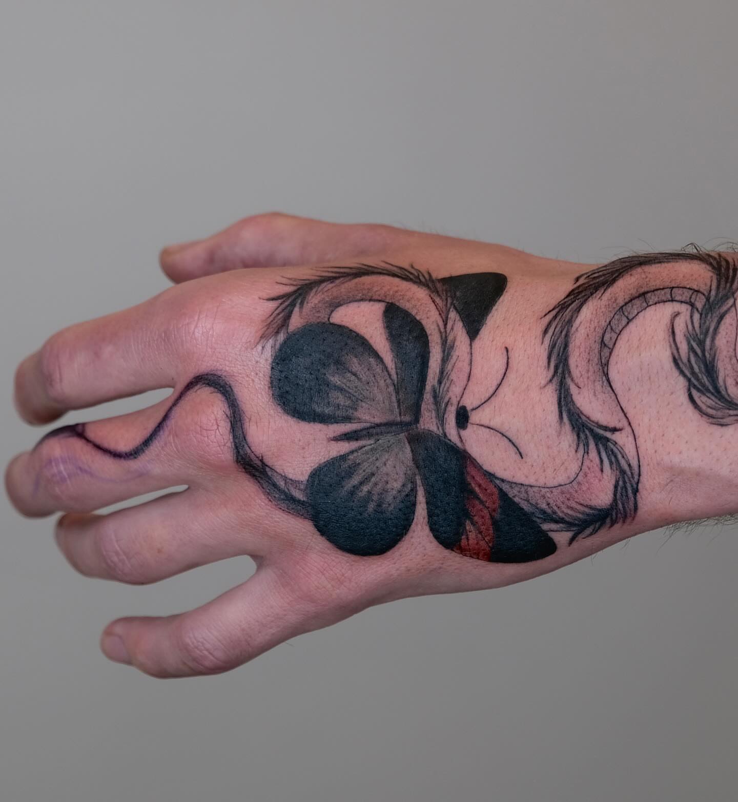 Butterfly black and grey tattoo on the hand by Ka hiu chiu