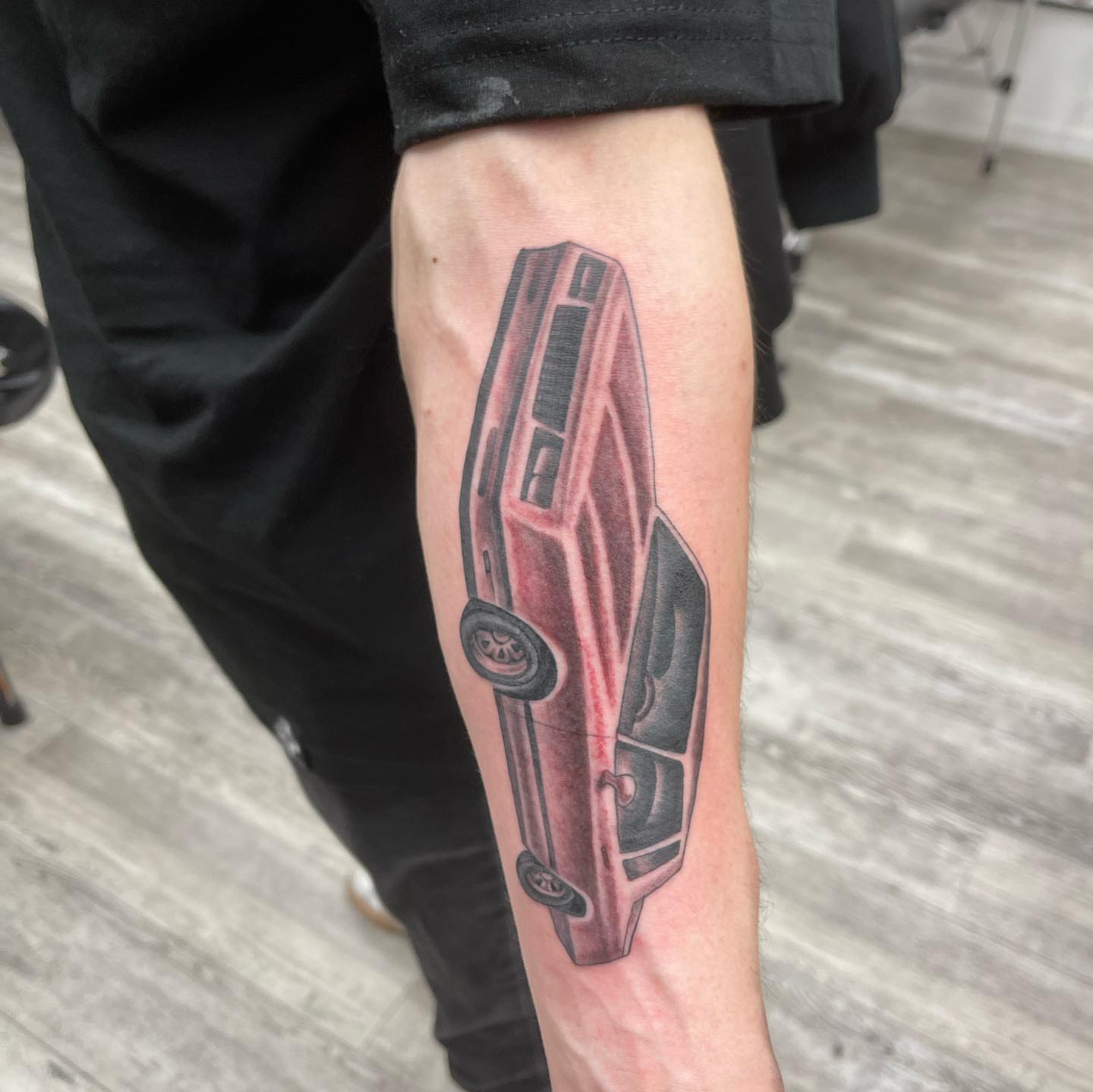 Car black and grey tattoo on the forearm by Mister Joe Joe Frisco Tattoo, San Francisco, California