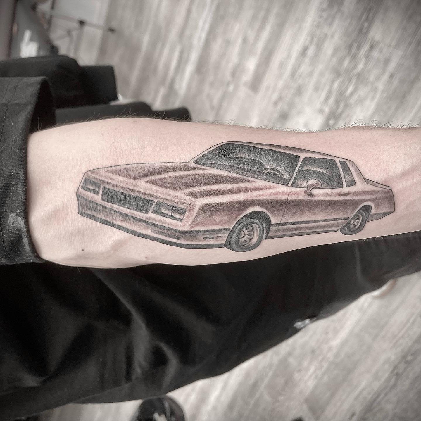 Classic car black and grey tattoo on the forearm by Mister Joe Joe Frisco Tattoo, San Francisco, California