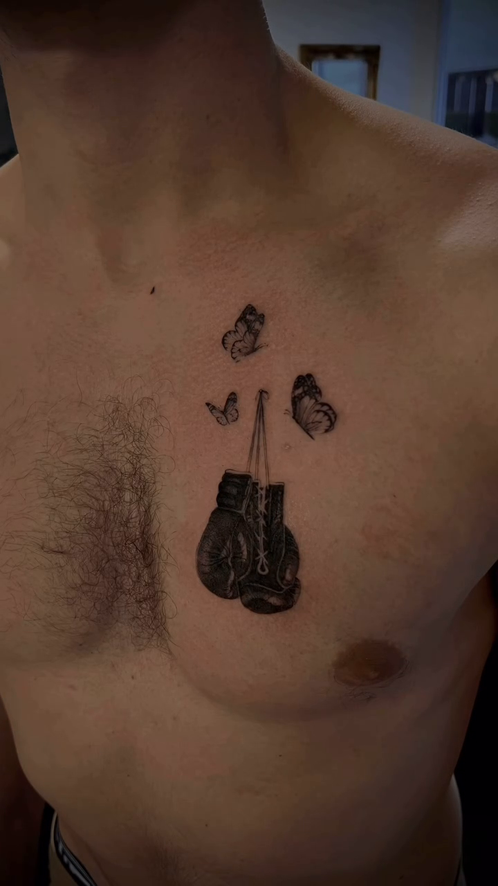 Boxing gloves and butterflies realism tattoo by sacramento tattoo CA