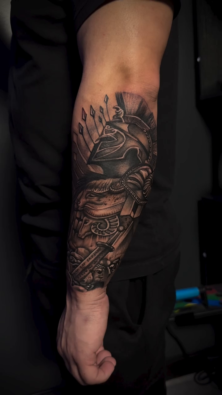 Spartan warrior helmet and armor realism tattoo by Paul burrows (Tatttoo Artist)