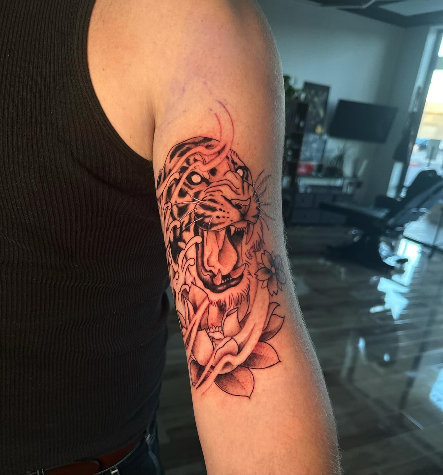 Tiger realism tattoo on the forearm by alex h🪴 neotrad