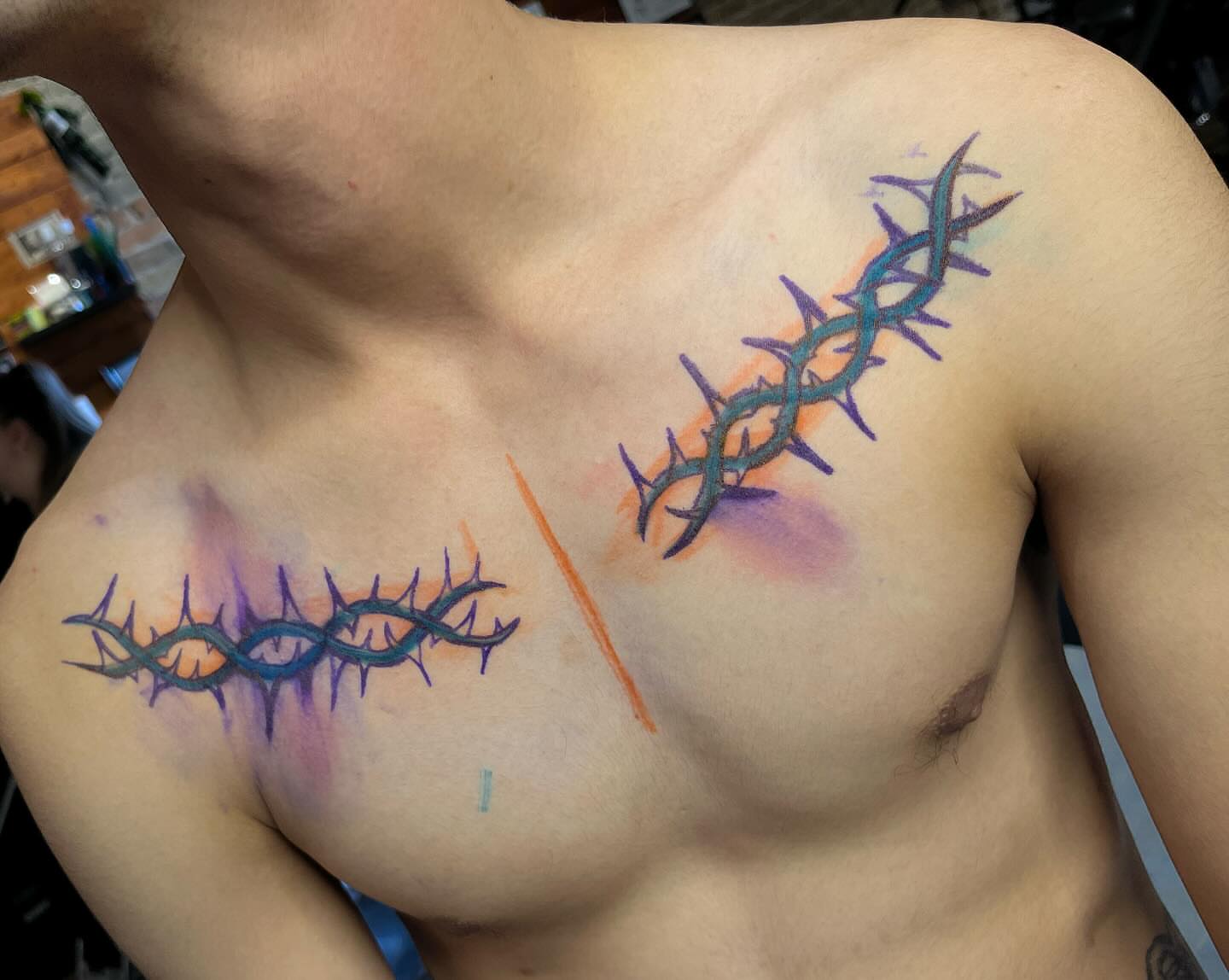 Thorn pattern dotwork tattoo on the chest by Taylor Newton