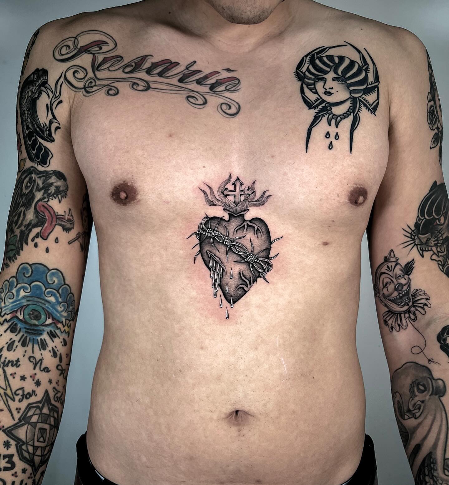 Sacred heart black and grey tattoo on the chest by Chriscalibur