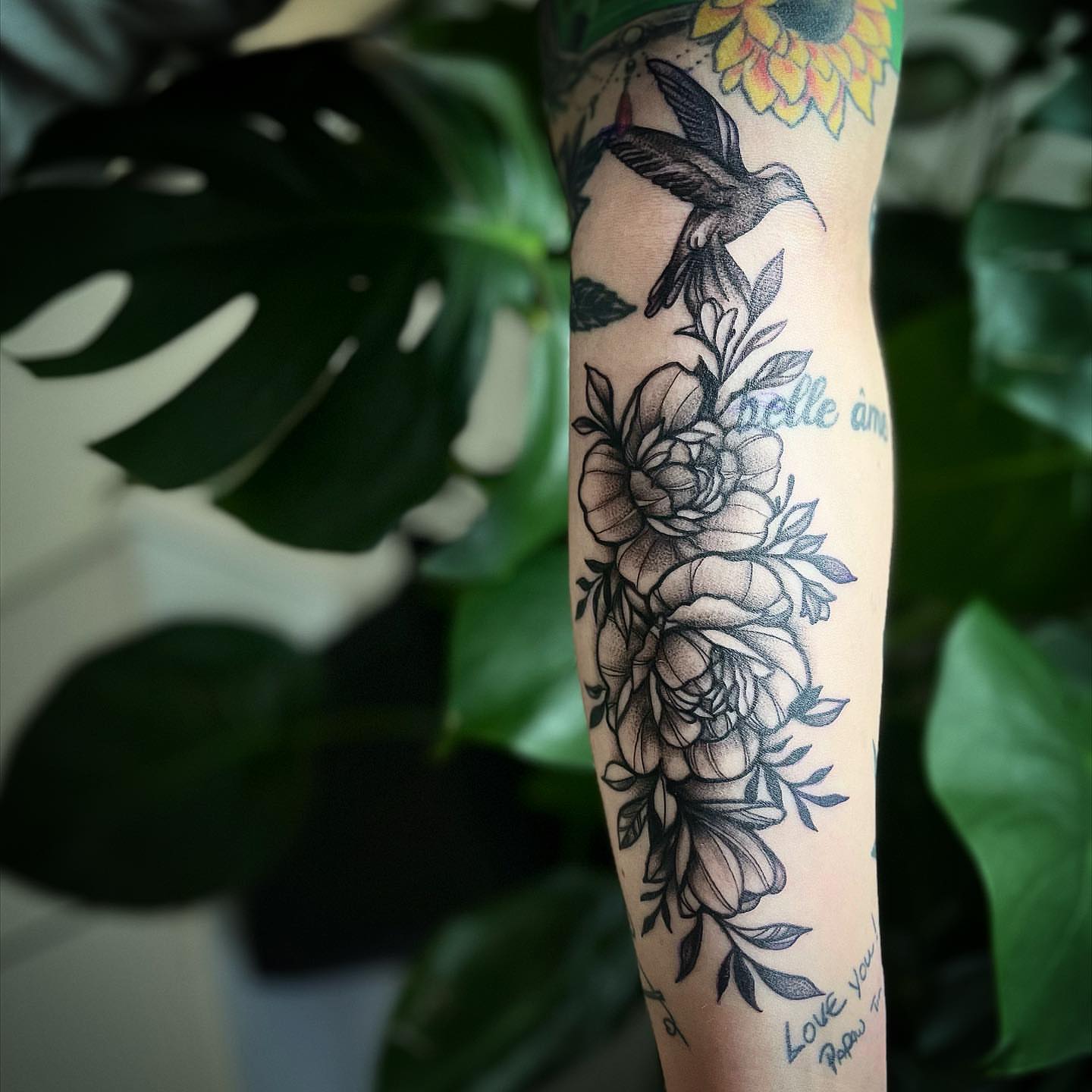 Floral bouquet with hummingbird ornamental tattoo on the forearm by π΅πππππ
