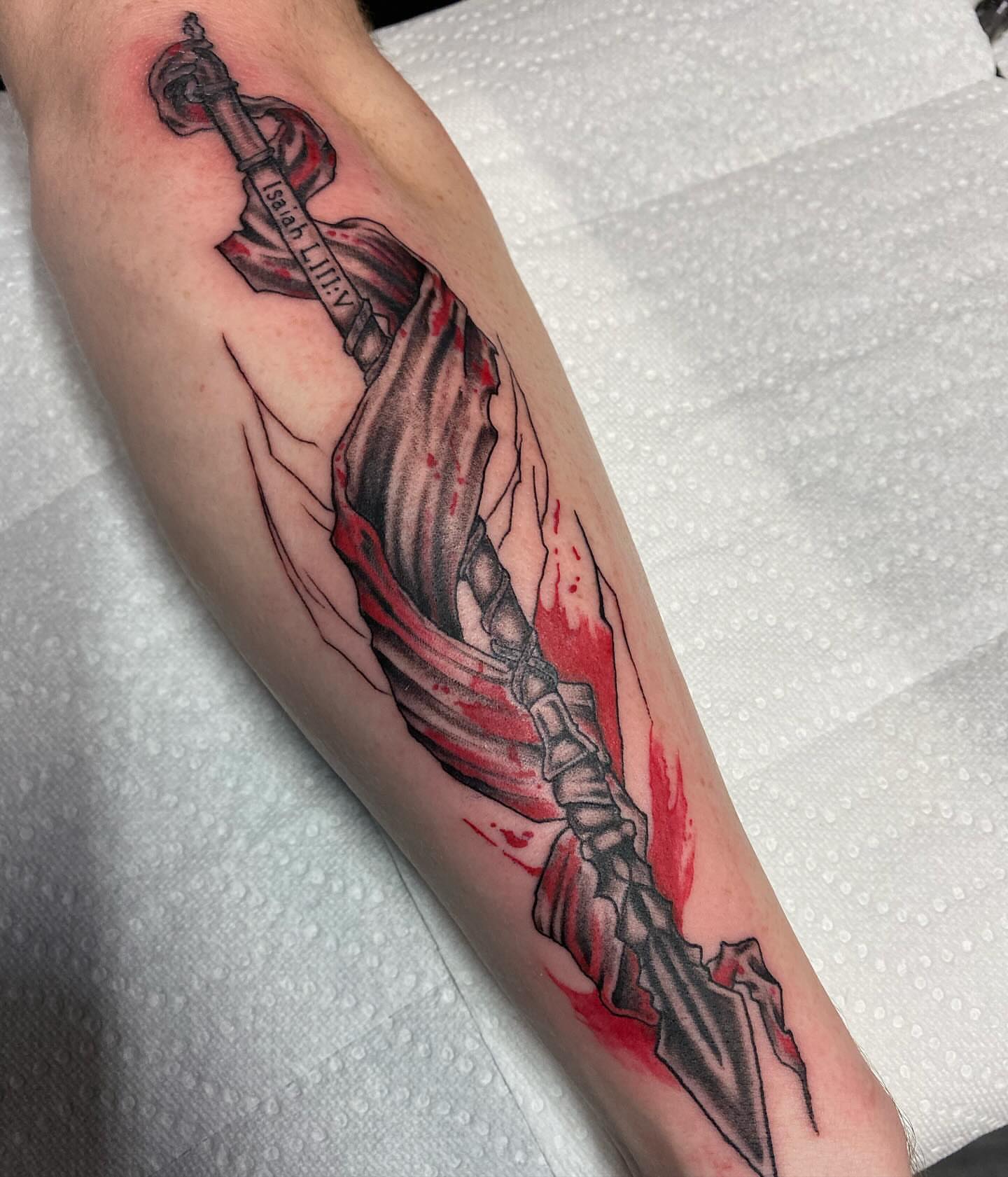 Sword and blood realism tattoo on the forearm by Anthony Pichardo 🦇