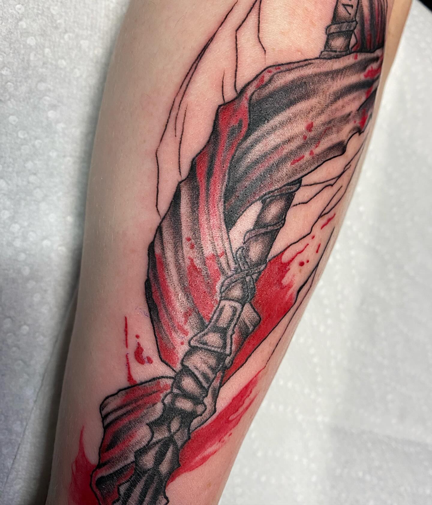 Sword and blood realism tattoo on the forearm by Anthony Pichardo 🦇
