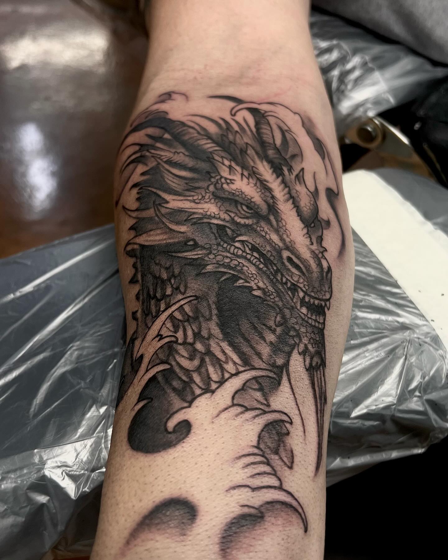 Tattoo by @daveisoldbutstillkicknit — black_and_grey, realism